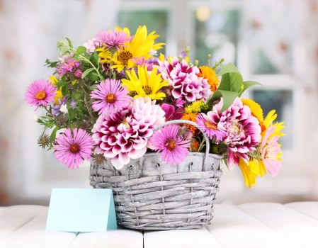 Expert florist arranging a vibrant flower bouquet